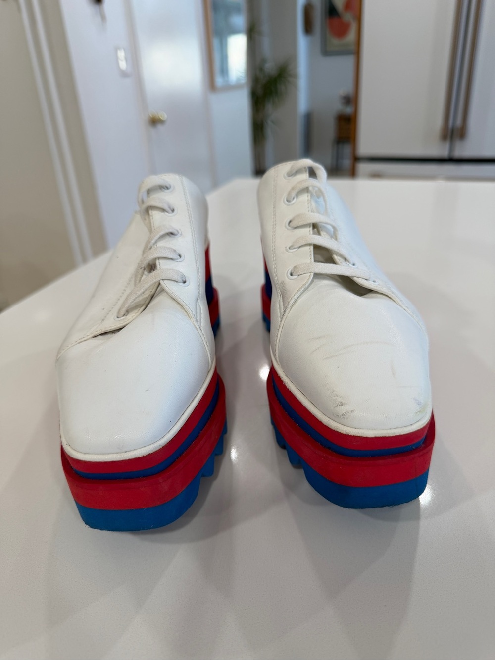 Stella McCartney White Lace-Up Platform Sneakers with Red & Blue Soles